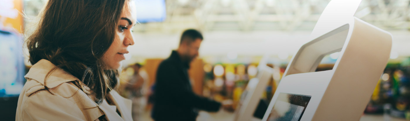 Woman at kiosk