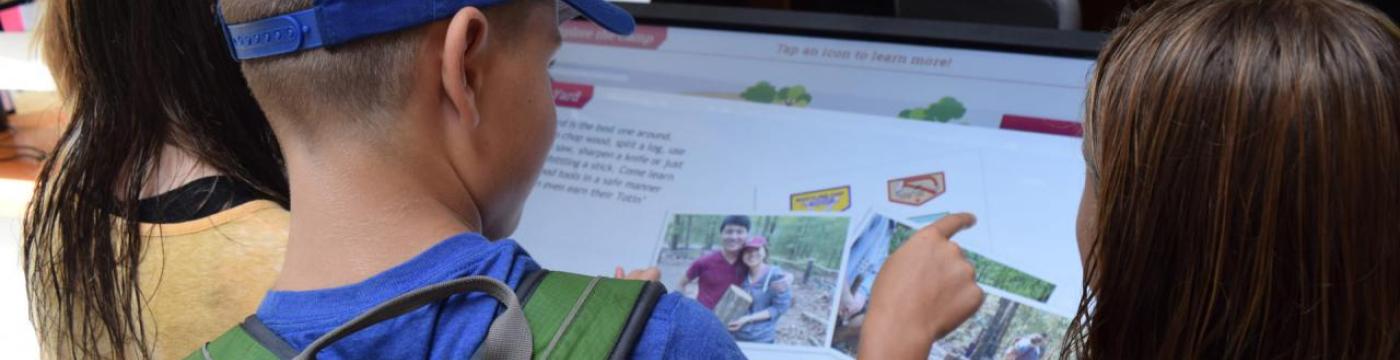 Boy Scouts using kiosk